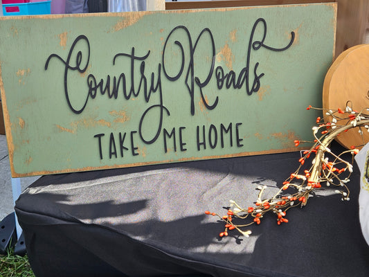 Country Roads Take Me Home Sign